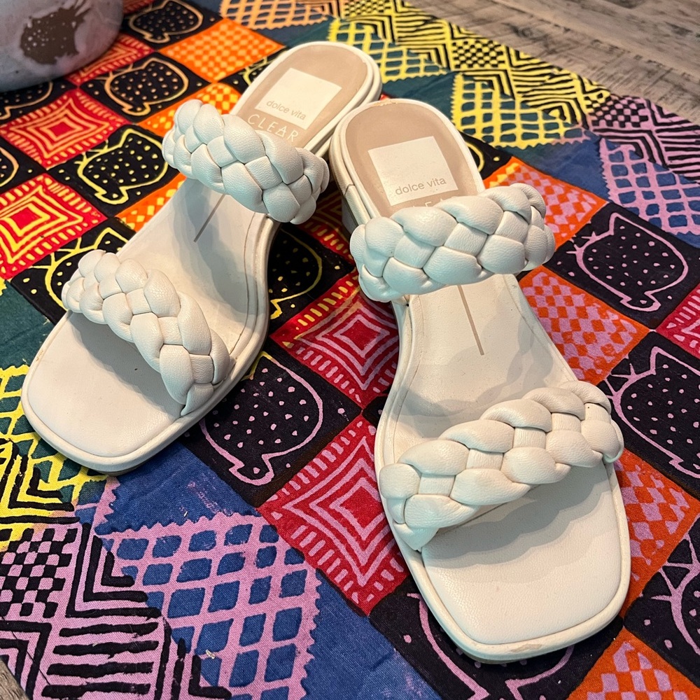 Cream color Dolce Vita braided leather sandals with block mid heel style.